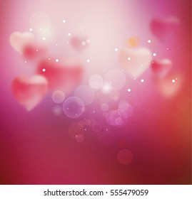 Background with hearts for Valentine's Day. Template for greeting card, declaration of love, congratulations on the wedding day. Pink. Blurred heart. Sparkling