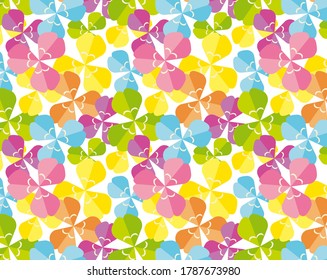 Background image of a three-leaf clover. Vector illustration of colorful clover. Seamless pattern