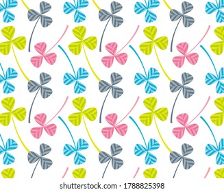 Background image of a three-leaf clover. Vector illustration of colorful clover. Seamless pattern