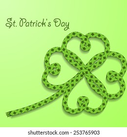 Background with inscription St. Patricks Day. Clover with four petals of green folded rope. Vector illustration.