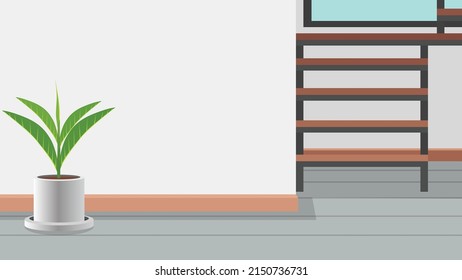 Background of interior design inside house with tree pot on the floor. Steel stairway leading upstairs is on the side. and the empty space of the wall in the middle of the house.