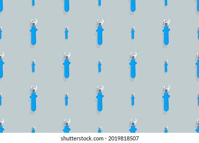 Fondo de una llave ajustable de metal con un mango de goma. Herramientas patrón sin fisuras.