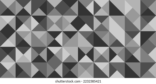 Fondo monocromo de triángulos en tonos grises.