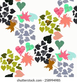 Background from multi-colored leaves on a white background. Seamless.