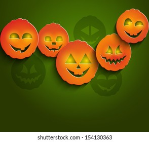 Background on Halloween pumpkins in paper style