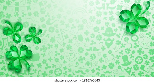 Background on St. Patrick's Day made of crystal clover leaves and other symbols in light green colors