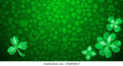 Background on St. Patrick's Day made of crystal clover leaves and other symbols in green colors