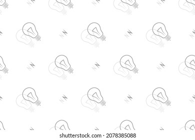 Background on the theme of light bulbs and lighting.Seamless pattern From the silhouette of light bulbs.