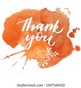Background with orange watercolor abstract splashes and thankful inspiration. hand drawn lettering and drawing flowers