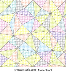 Background in a patchwork style with a houndstooth pattern. Seamless pattern.