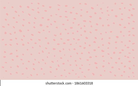 The background is pink with lots of freckles