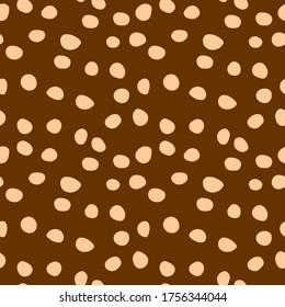 Background polka dot. Seamless pattern. Random dots, circles, animal skin. Design for fabric, wallpaper. Irregular random abstract vector texture. Repeating graphic backdrop