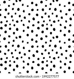 Background polka dot. Seamless pattern. Random dots, circles, animal skin. Design for fabric, wallpaper. Irregular random abstract vector texture. Repeating graphic backdrop