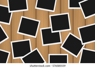 Background of realistic photo frames on brown wooden texture. Template retro photo design. Vector illustration