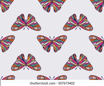 Background seamless pattern of colored butterflies.