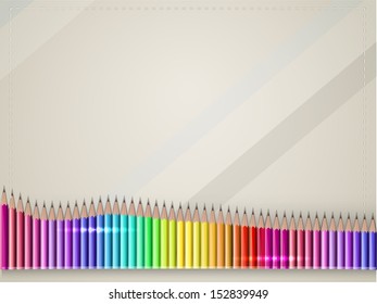 background with set of pencils of all rainbow colors