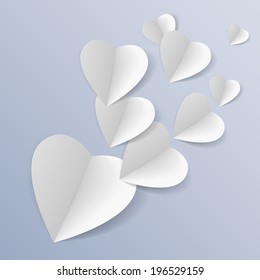 Background with several white folded paper hearts