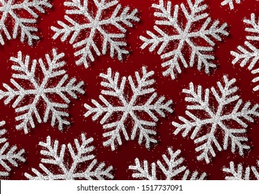 Background silver snowflakes strewn with bright sparkles. Winter festive pattern. Glitter white snowflakes texture. Christmas backdrop. Xmas decoration. vector illustration