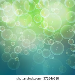 Background with soap bubbles on a bright background