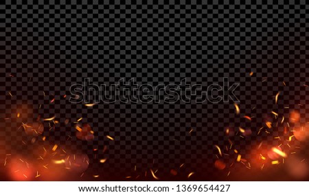 Background with sparks of fire on black background.