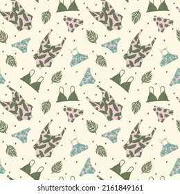 El fondo de la ropa de verano para la playa. Bikinis y bañador con hojas tropicales. Un patrón en un círculo de follaje tropical para textiles. Ilustración del vector