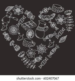 background with sweets in the shape of a heart: chocolate, candy, twigs, coffee, mug, on a black background