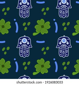 The background is a symbol of fortune. Hamsa amulet for good luck. Illustrations of colored clover. Symbols of good luck. A pattern for luck drawn by hand. Vector illustration