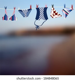 Background for text with blurred beach and swimwear