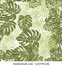 Background of tropical leaves. Tropical seamless pattern with leaves.
