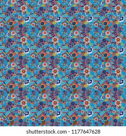 Background wallpaper illustration with blue, red and violet flowers and vintage paisley ornaments. Modern luxury texture for fabrics, textile. Vector floral seamless pattern.