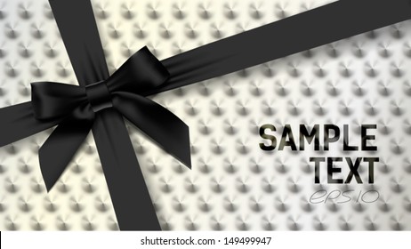 background white spikes with black bow
