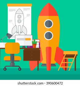 Background of workspace with business start-up rocket.