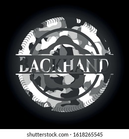 Backhand on grey camo texture