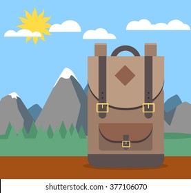 backpack on table with nature mountains sun sky trees flat design