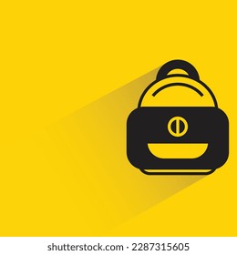 backpack with shadow on yellow background
