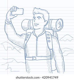 Backpacker making selfie.