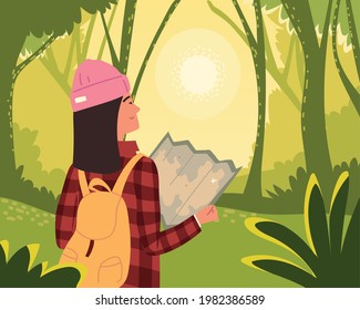 mujer mochilera con mapa en el bosque