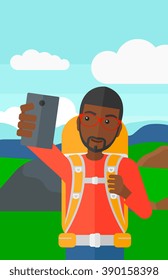 Backpckaer making selfie.