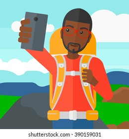 Backpckaer making selfie.