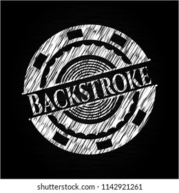 Backstroke chalk emblem written on a blackboard