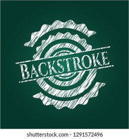 Backstroke chalk emblem written on a blackboard