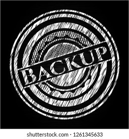 Backup chalkboard emblem written on a blackboard
