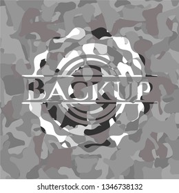 Backup on grey camouflaged texture