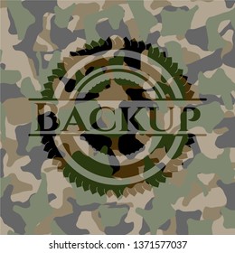 Backup written on a camouflage texture