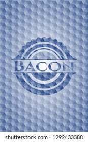 Bacon blue badge with geometric pattern background.