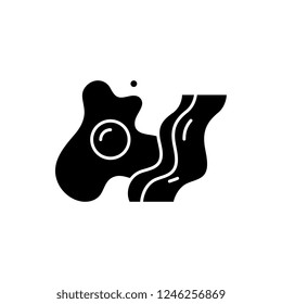 Bacon and eggs black icon, vector sign on isolated background. Bacon and eggs concept symbol, illustration 