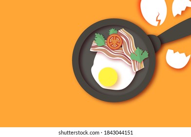Bacon, eggs and cooking pan with handle. Omelet papercut style. Farm products. Fast food. Natural product. Food ingredients. Slices of crisp bacon. Ham. Tomato. Orange.