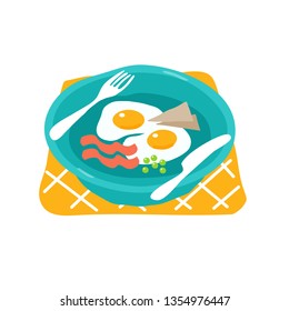 Bacon and eggs. Fried eggs on the plate. Delicious breakfast.
