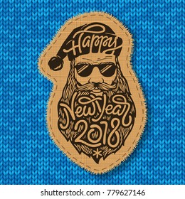Bad Santa with glasses and big beard with the lettering Happy New Year 2018 on knitted background. Stitched Christmas tree decoration made of fabric. Vector illustration.