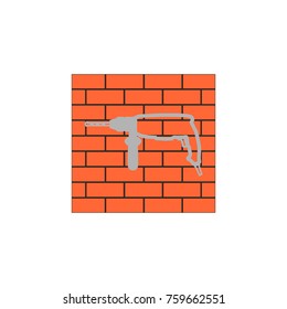 badge of a jackhammer on a brick wall
